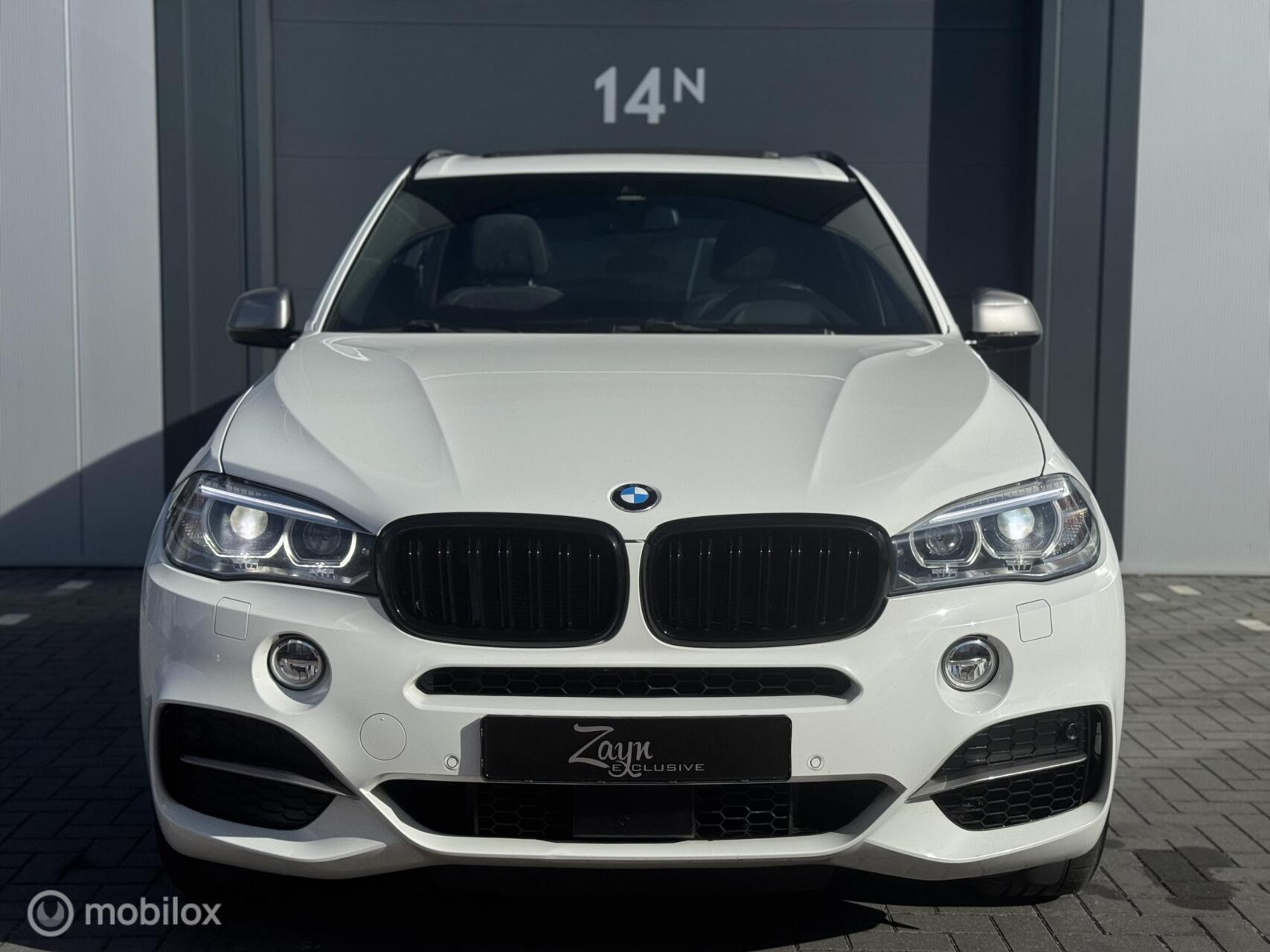 Foto van BMW X5 M50d