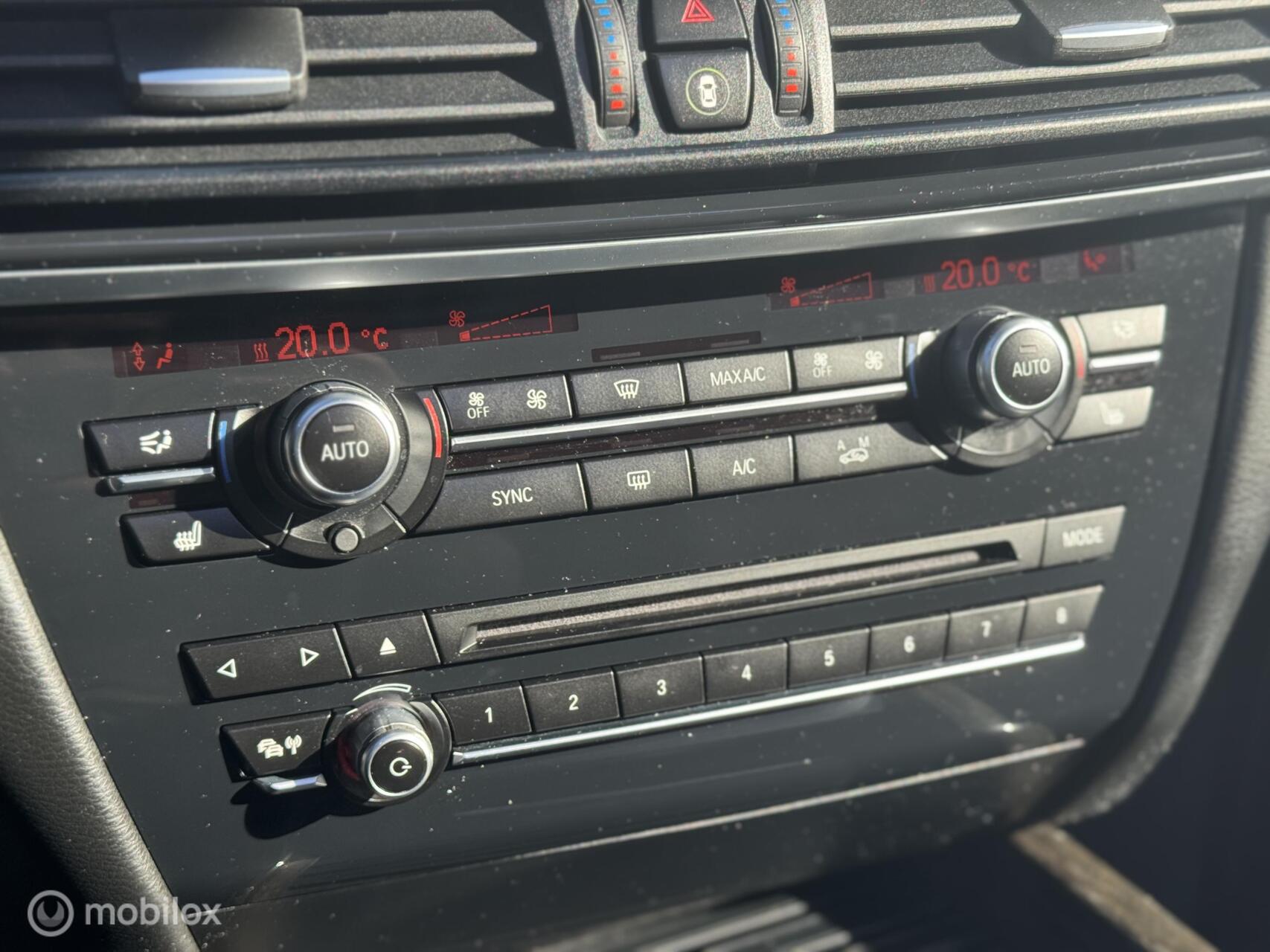 Foto van BMW X5 M50d