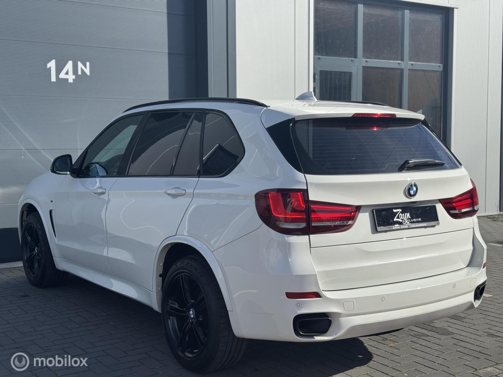 Foto van BMW X5 M50d