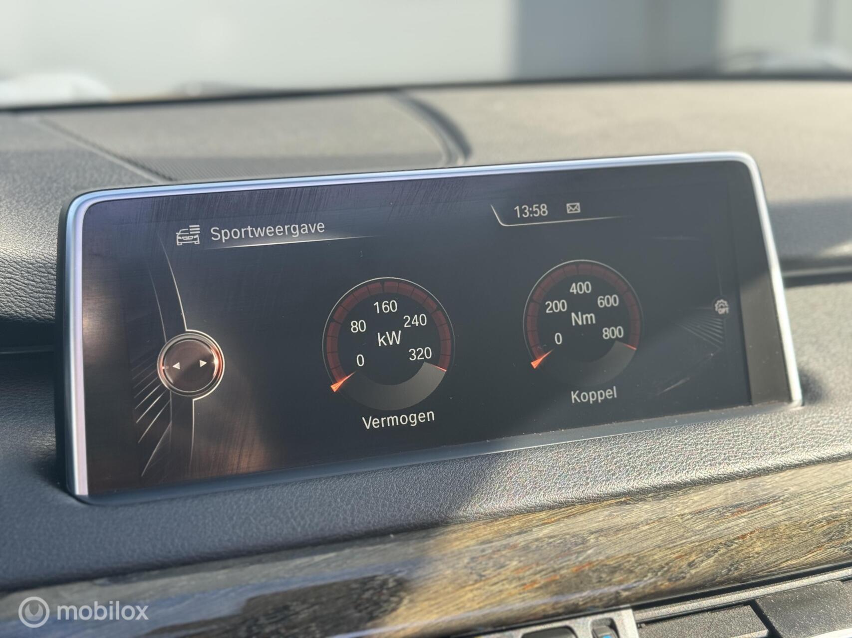 Foto van BMW X5 M50d