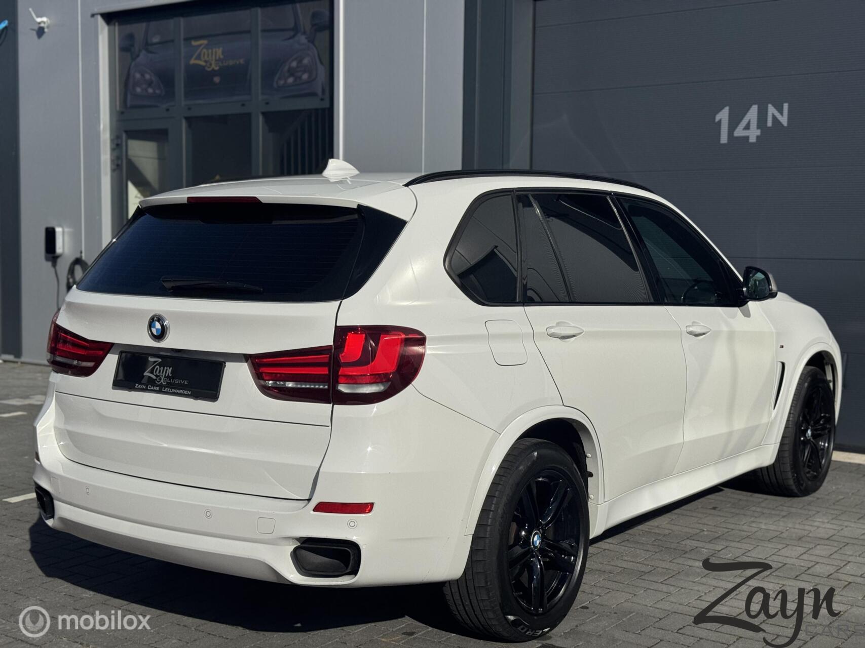 Foto van BMW X5 M50d