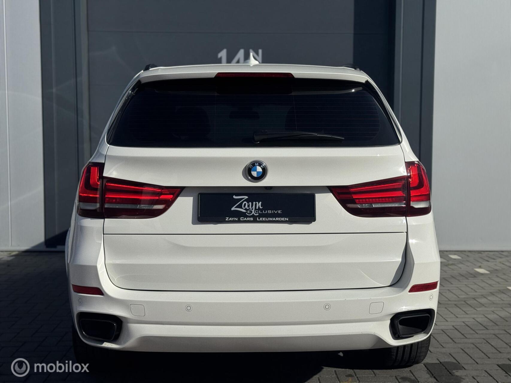 Foto van BMW X5 M50d