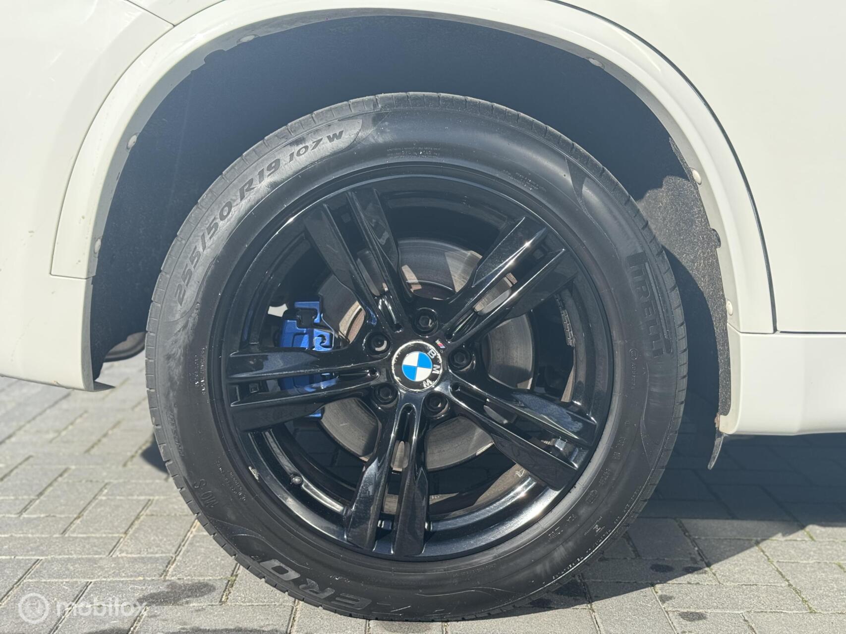 Foto van BMW X5 M50d