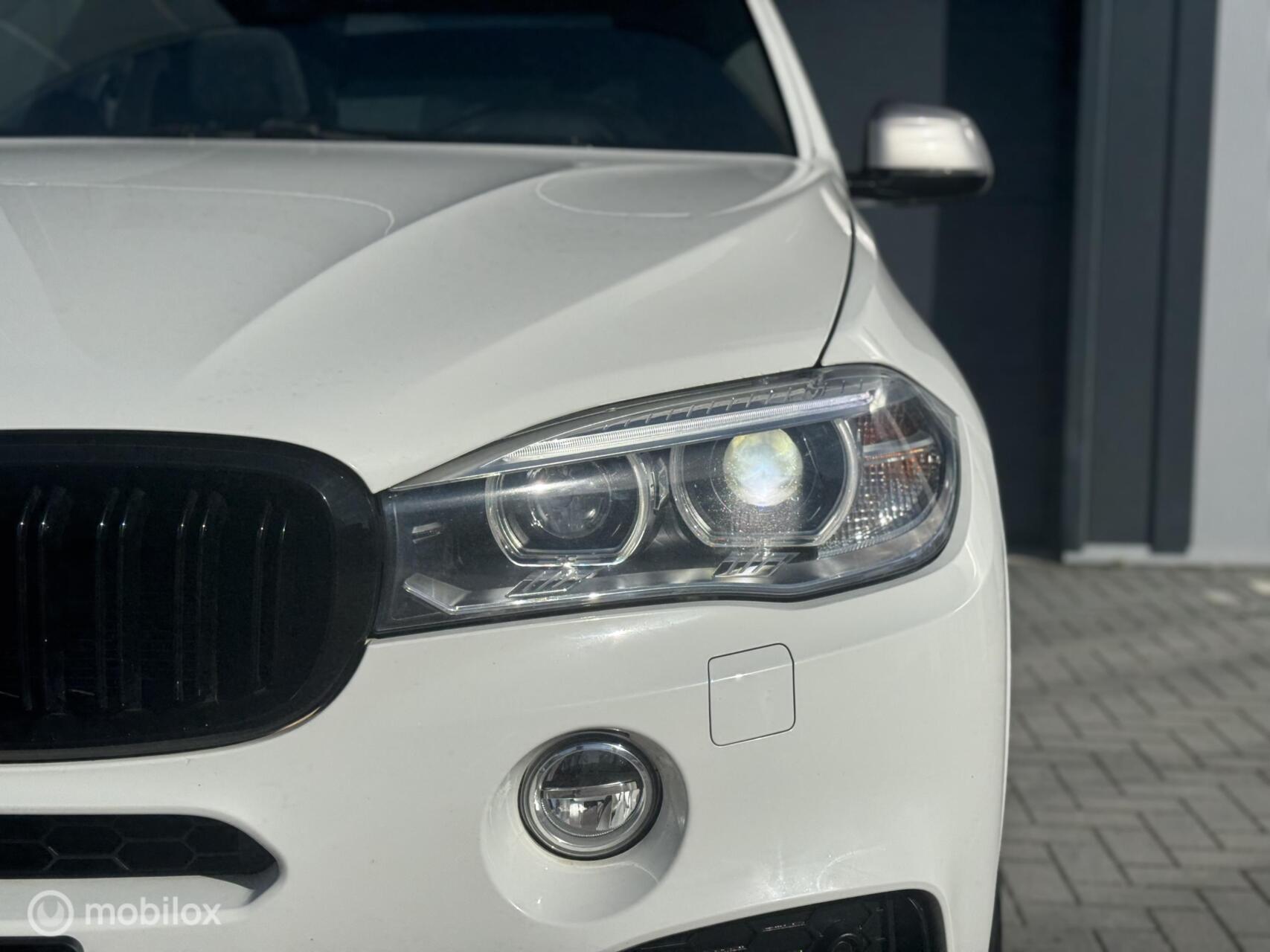 Foto van BMW X5 M50d