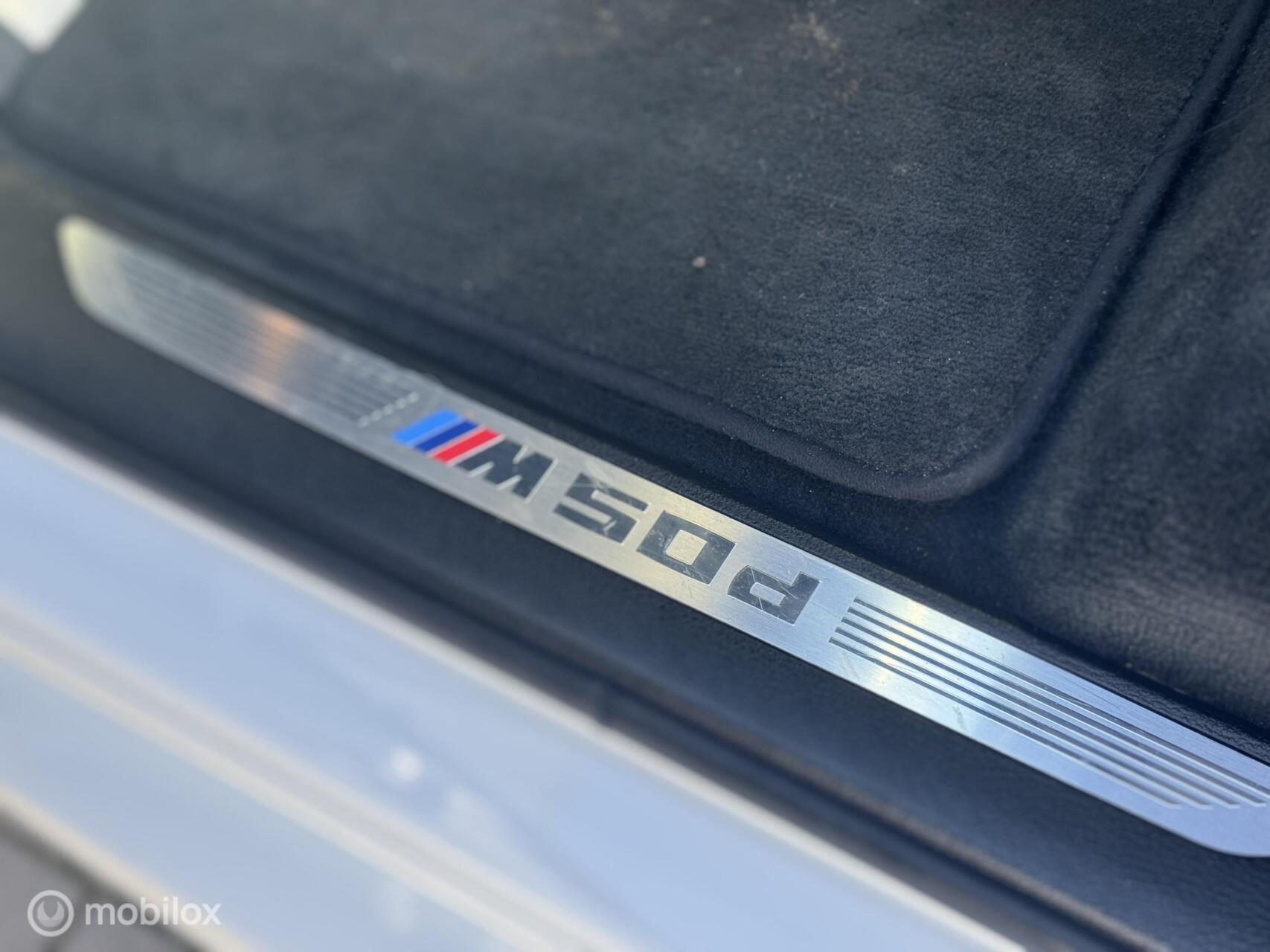 Foto van BMW X5 M50d