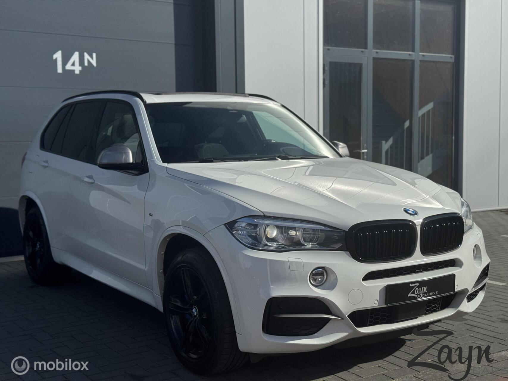 Foto van BMW X5 M50d