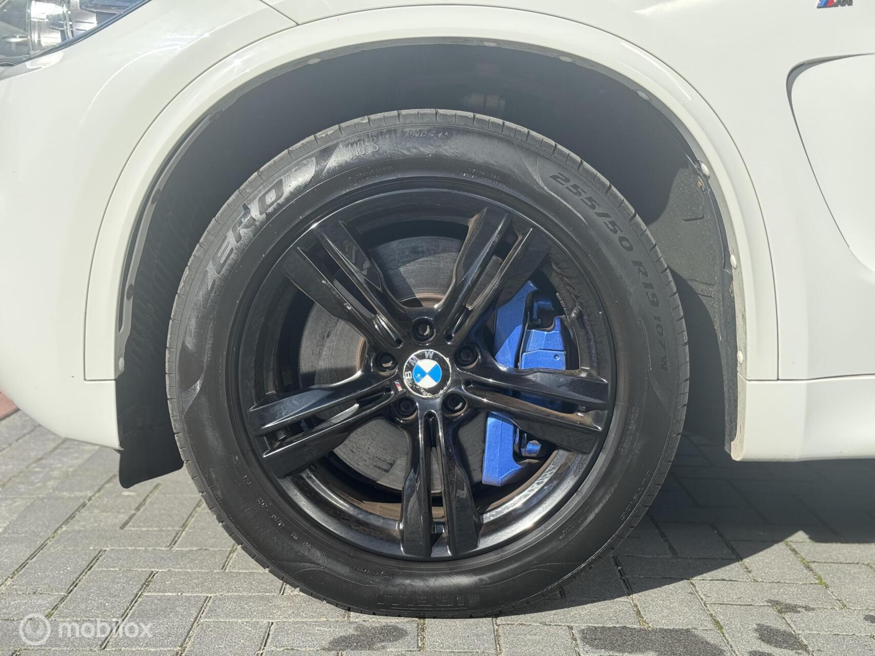 Foto van BMW X5 M50d