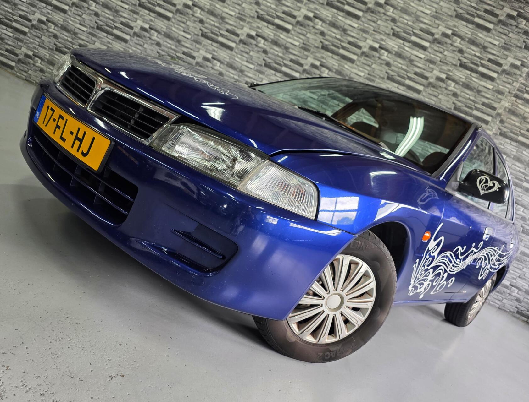 Mitsubishi Lancer 1.3 GLi *Stuurbekrachtiging* 2e eigenaar*! 2000 - voorkant