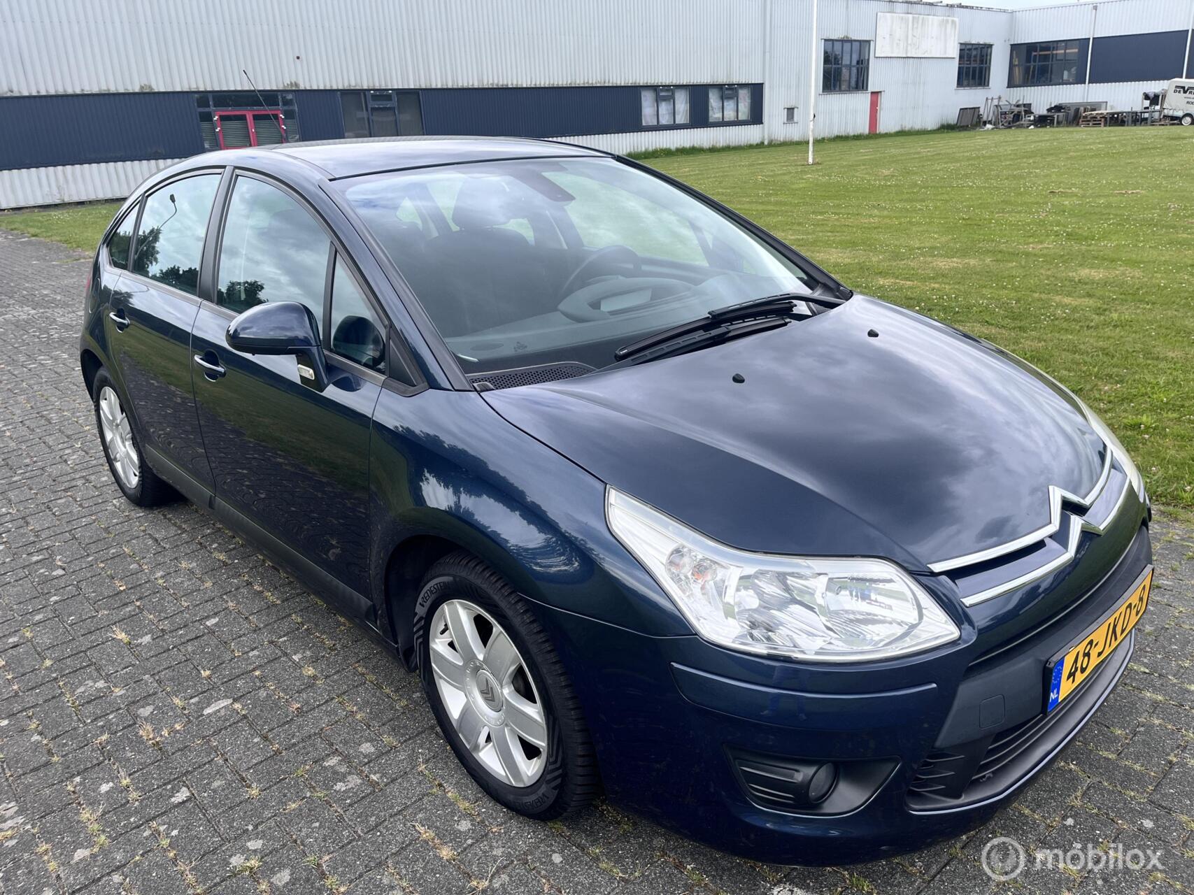 Citroen C4 1.6 VTi Prestige / Navi / Cruise / Airco / APK / NAP / PDC / 2009 - voorkant