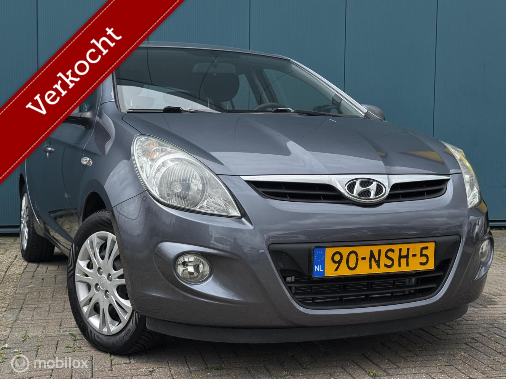 Hyundai I20 1.2i DynamicVersion 1Ste Eigenaar 5Drs Airco Trekhaak APK 24-06-2027 2010 - voorkant