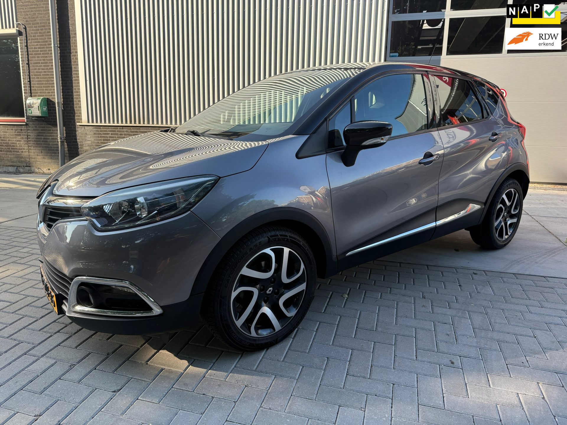 Renault Captur 1.2 TCe 120PK Dynamique + NAP|OH historie|Keyless|LED|Camera|Navi|Climate|Cruise|PDC|17"LMV 2014 - voorkant