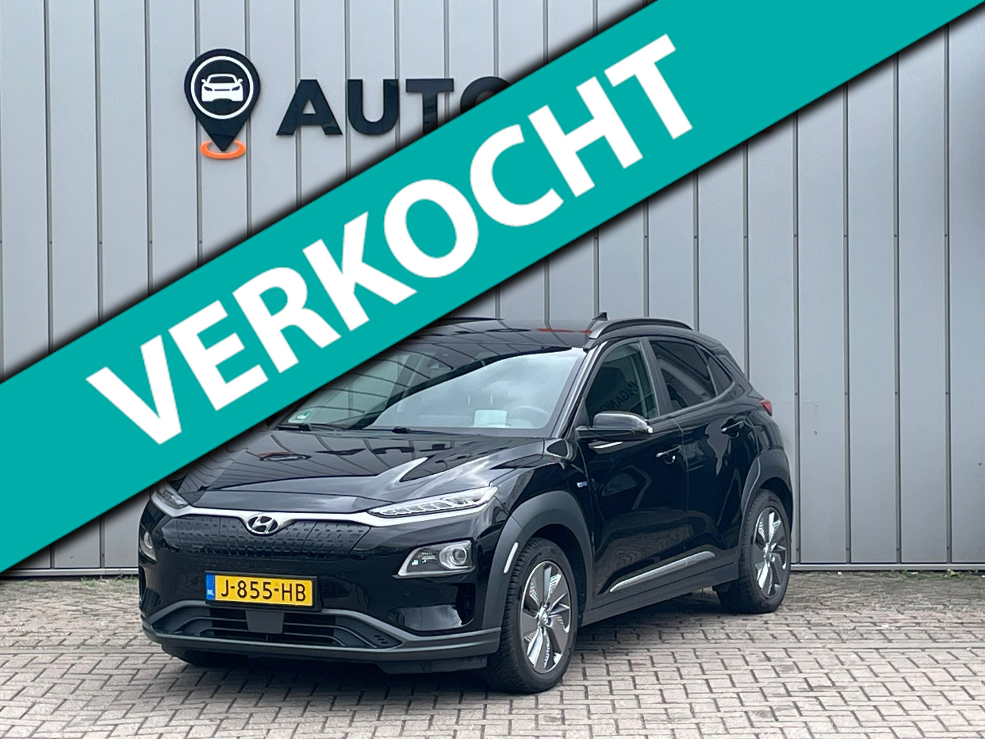 Hyundai Kona 64 kWh 204pk EV Premium | SOH 100% | Leder | Stuur- en Stoelverwarming | CarPlay | Camera | PDC V+A | 17" | ACC | LED 2020 - voorkant