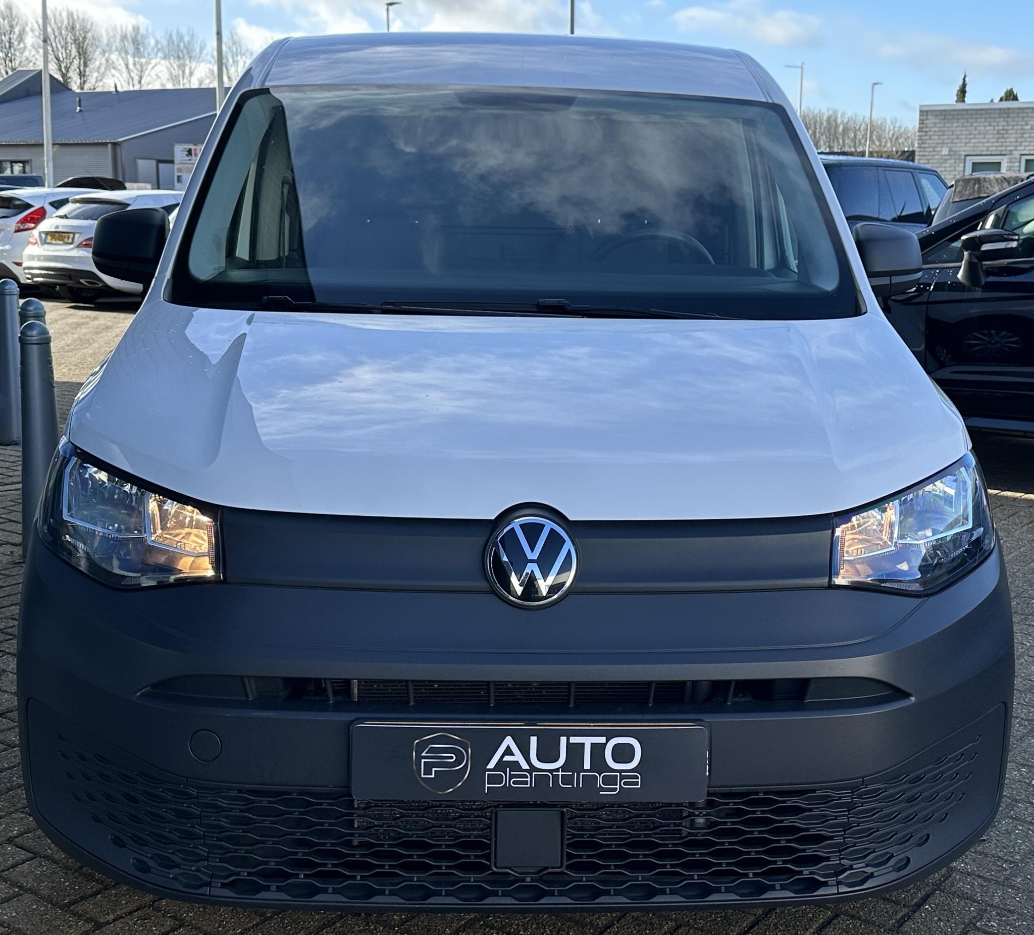 Foto van Volkswagen Caddy Modified Partition Wall