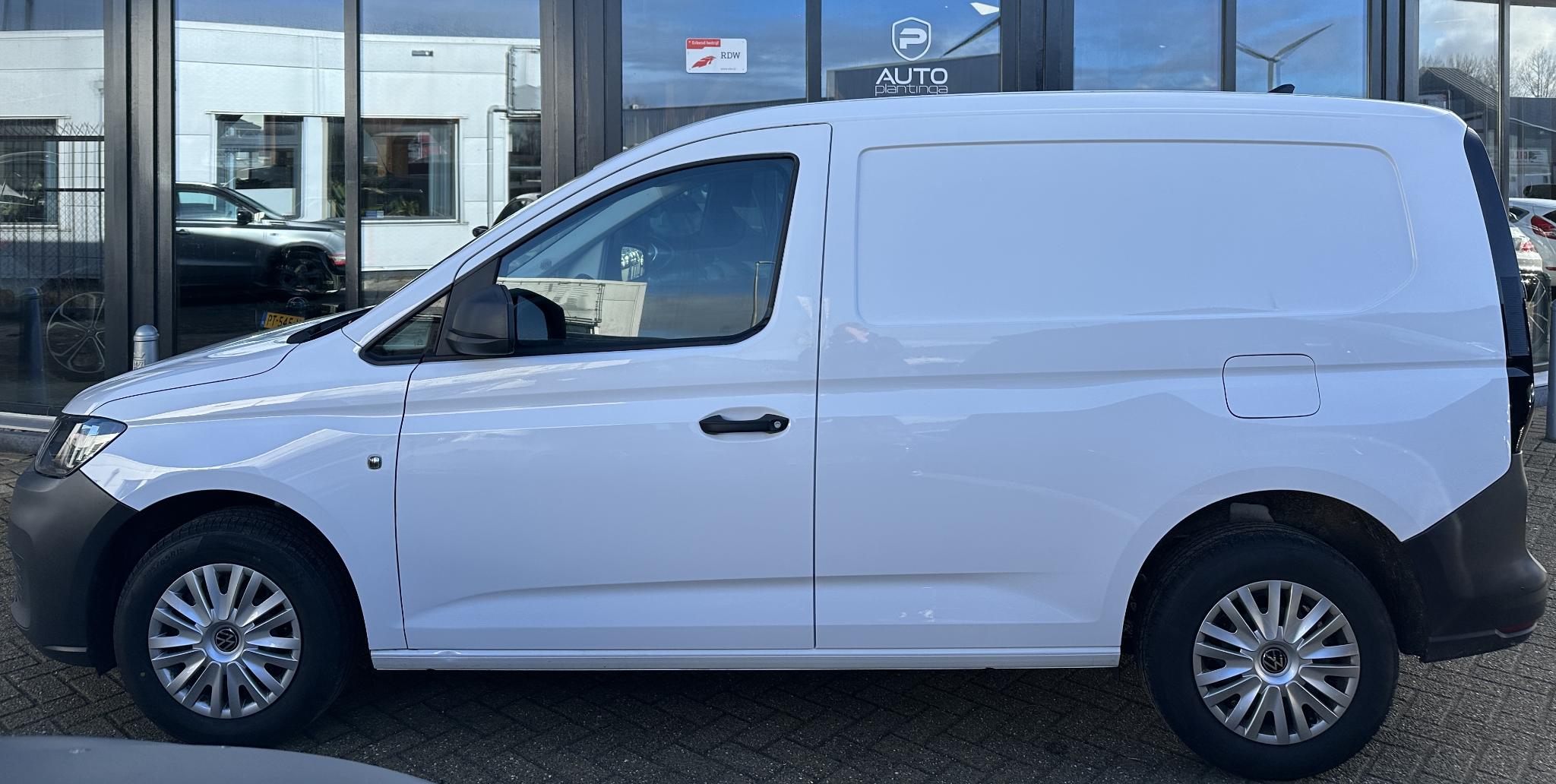 Foto van Volkswagen Caddy Modified Partition Wall