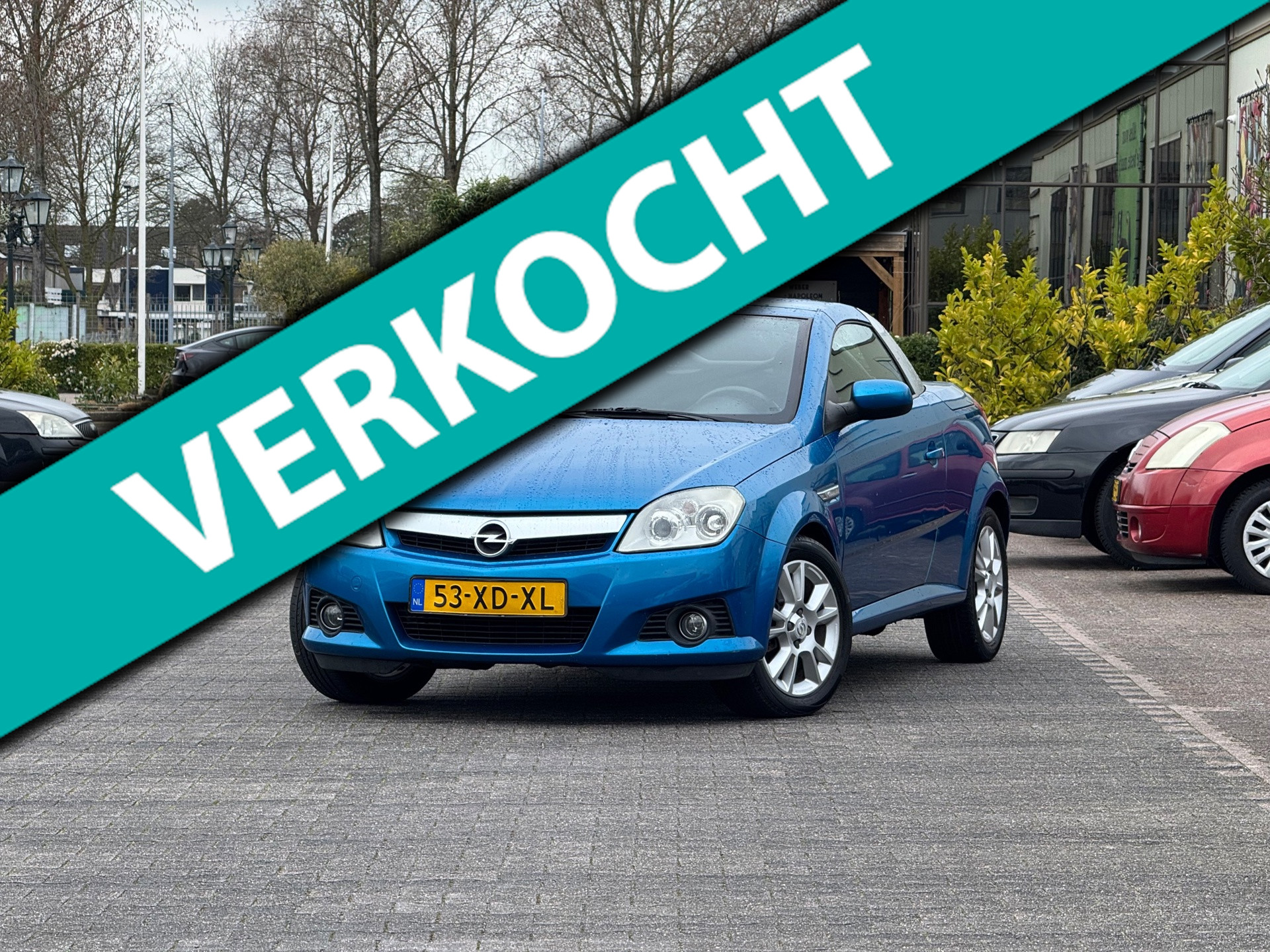 Opel Tigra Twintop 1.4-16V TwinTop | Sportstoelen | Elektrische ramen | Airco | 2 sleutels | LM velgen | 2007 - voorkant