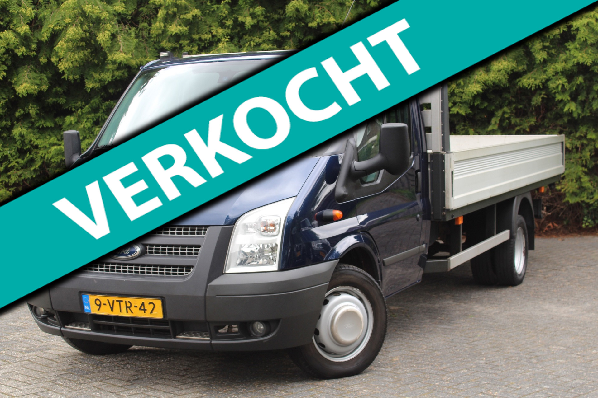 Ford Transit/tourneo 350L 2.2 TDCI Ambiente EF 125PK Open Laadbak | Dubbelucht | Airco | Trekhaak | 2012 - voorkant