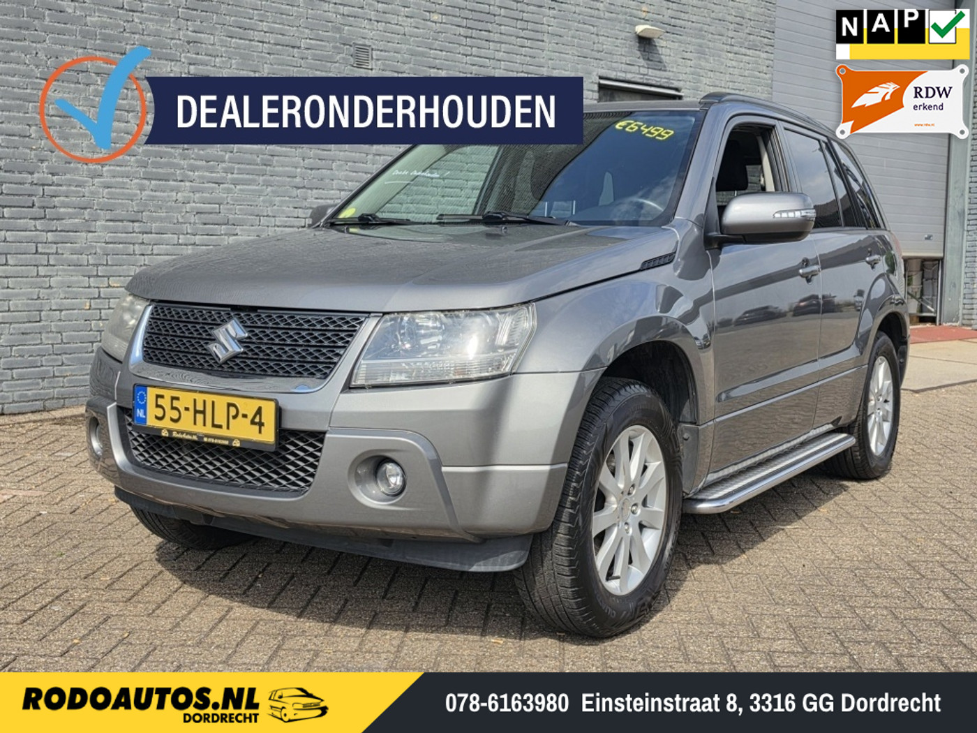 Suzuki Grand Vitara 2.0-16V Exclusive 4x4 Airco/Cruise ✅ 2009 - voorkant