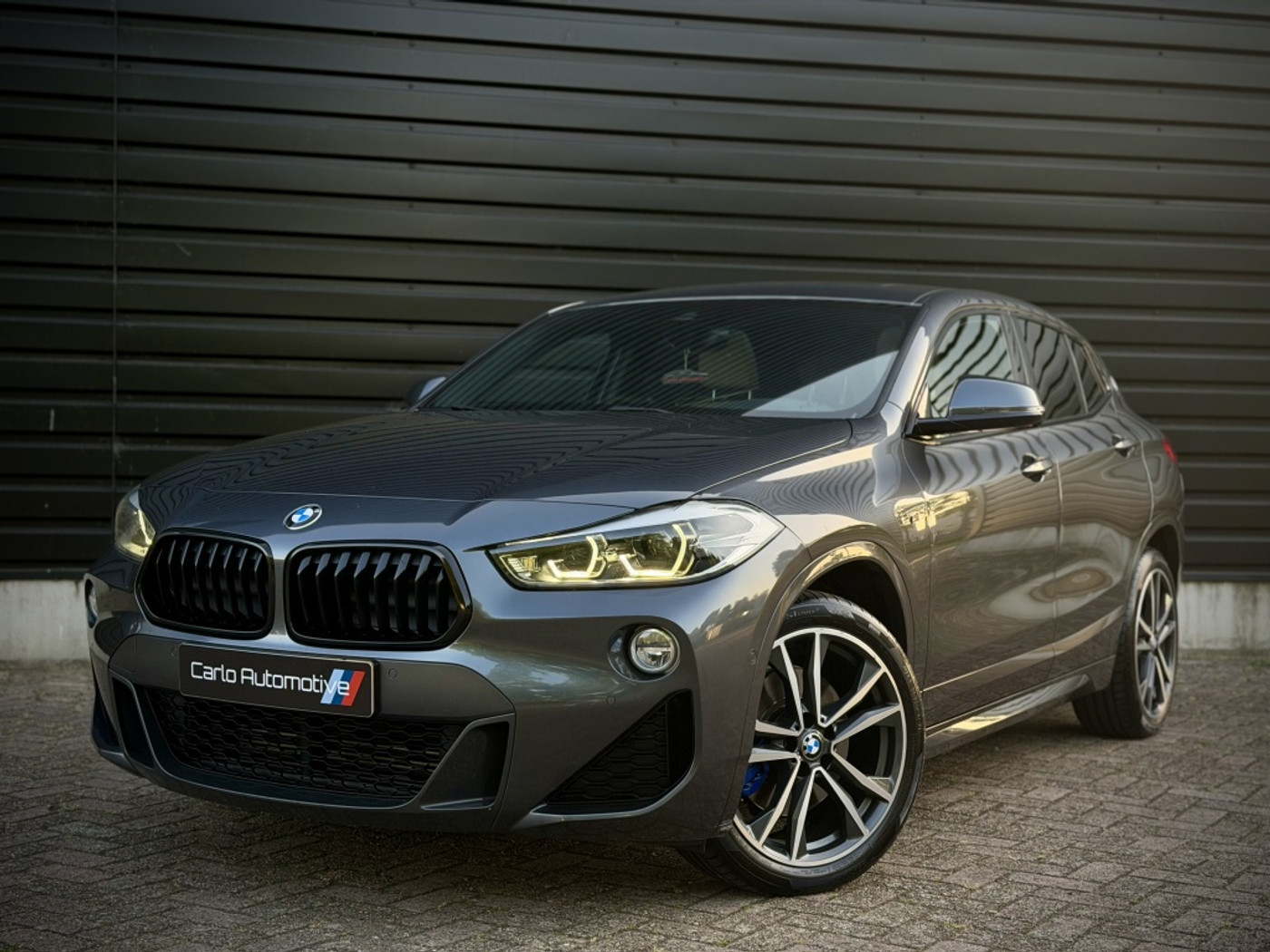 BMW X2 Sdrive20i sDrive20i M-SPORT PANO|HUD|H/K|CAMERA|KEYLESS 2018 - voorkant