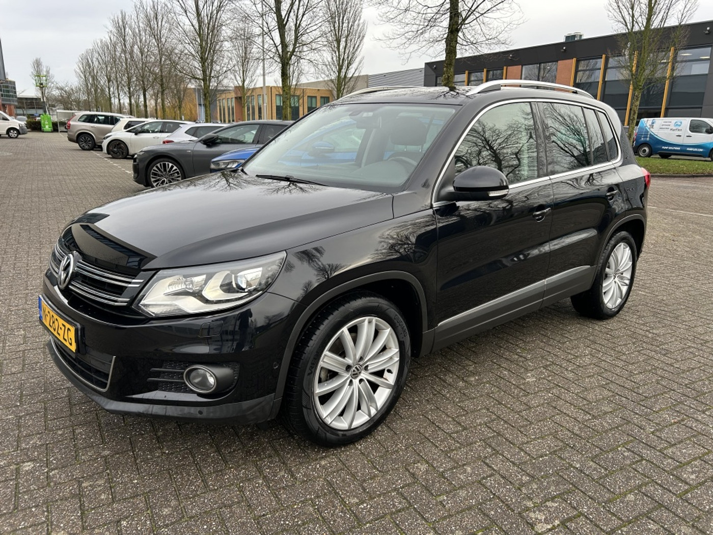 Volkswagen Tiguan 1.4 TSI Sport&Style LEER PANO STOELVW TRHK. 2013 - voorkant