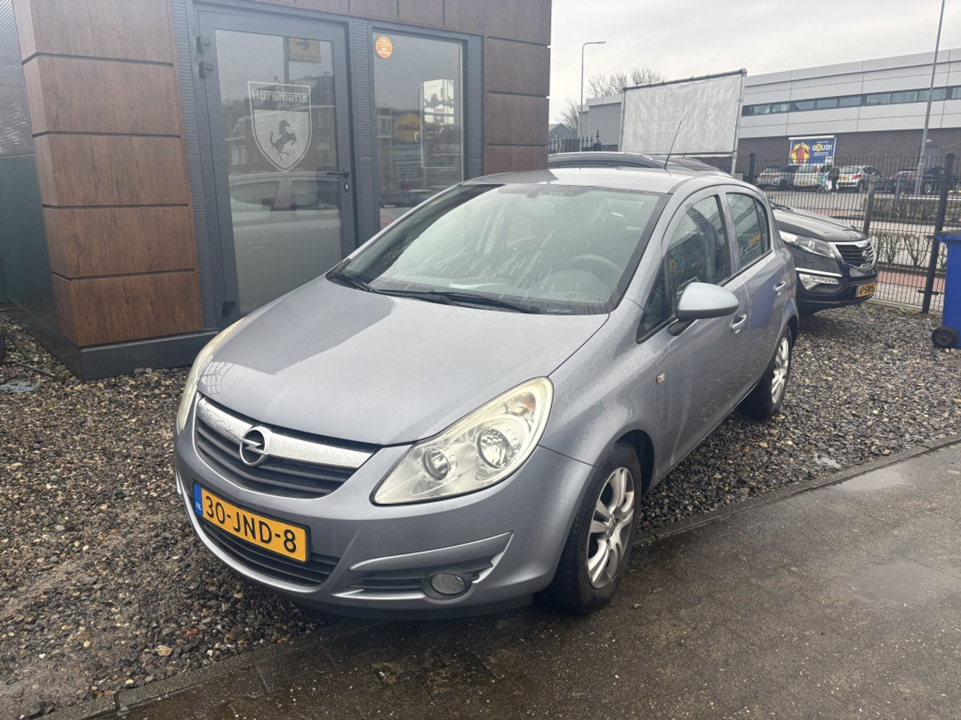 Opel Corsa 1.4-16V Enjoy 2009 - voorkant