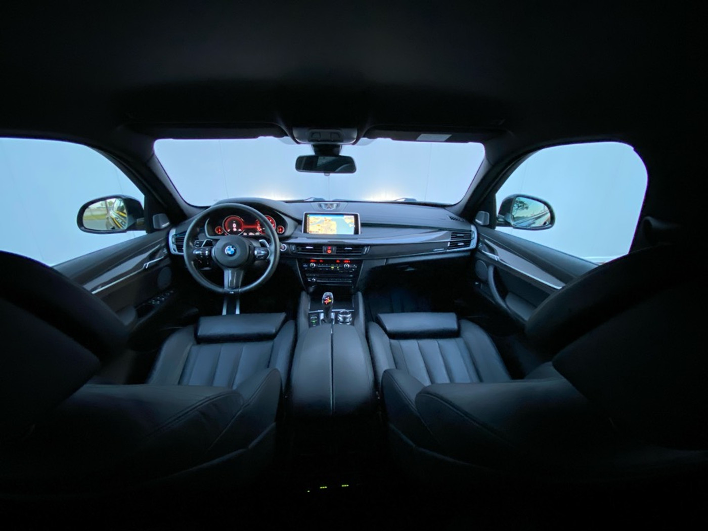Foto van BMW X6 M50d