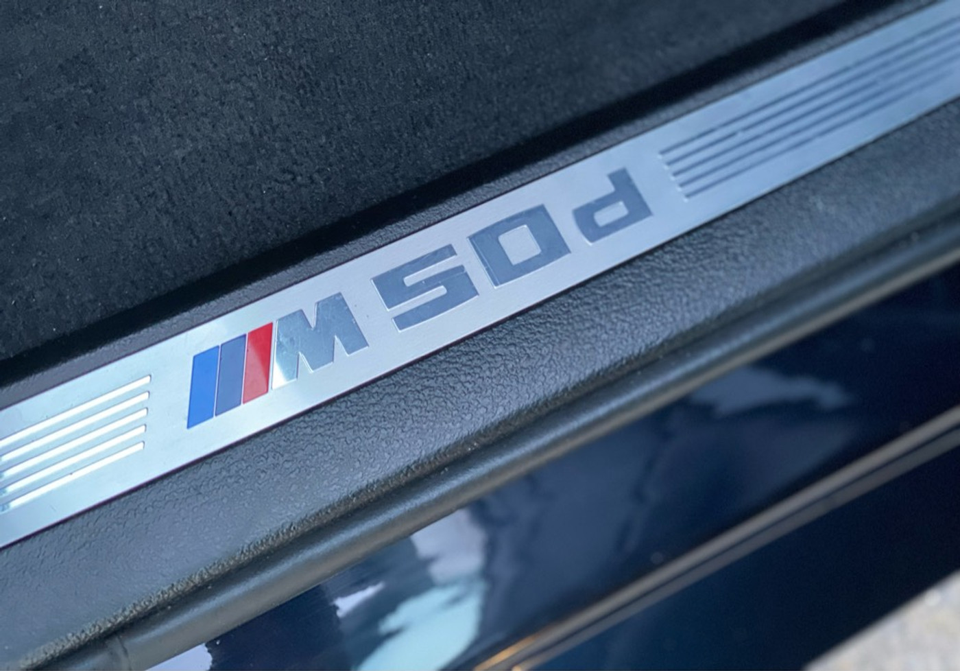 Foto van BMW X6 M50d