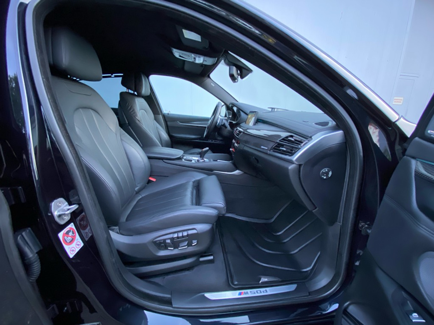 Foto van BMW X6 M50d