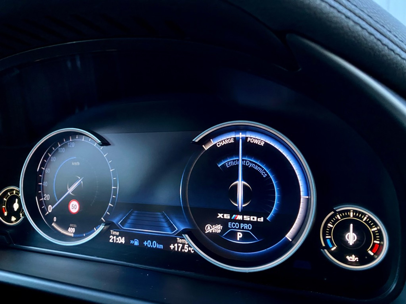 Foto van BMW X6 M50d