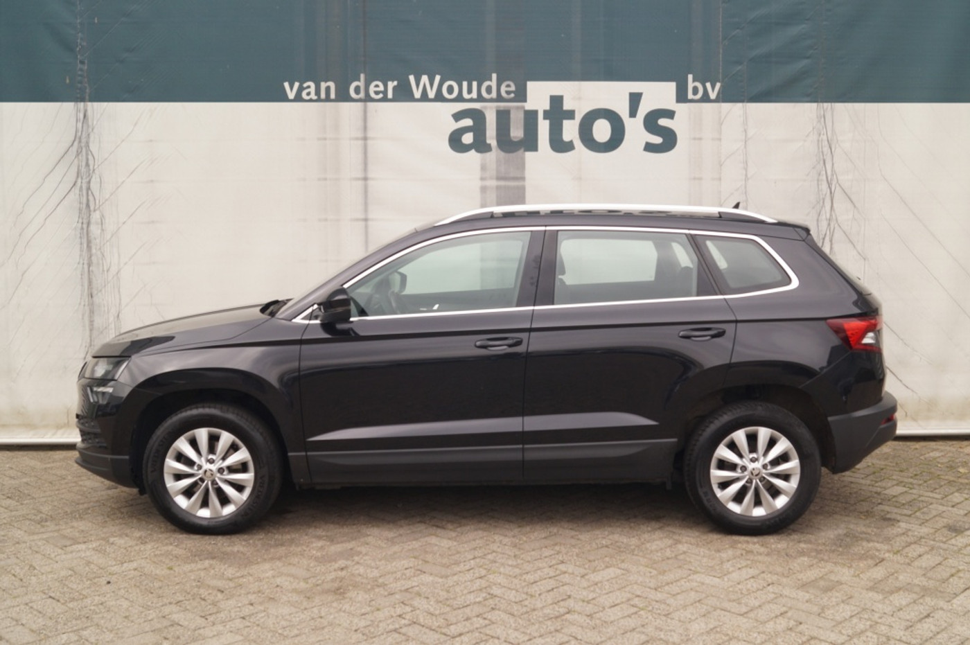 Skoda Karoq 1.5 TSI 150pk DSG Business Edition -NAVI-ECC-PDC- 2021 - voorkant