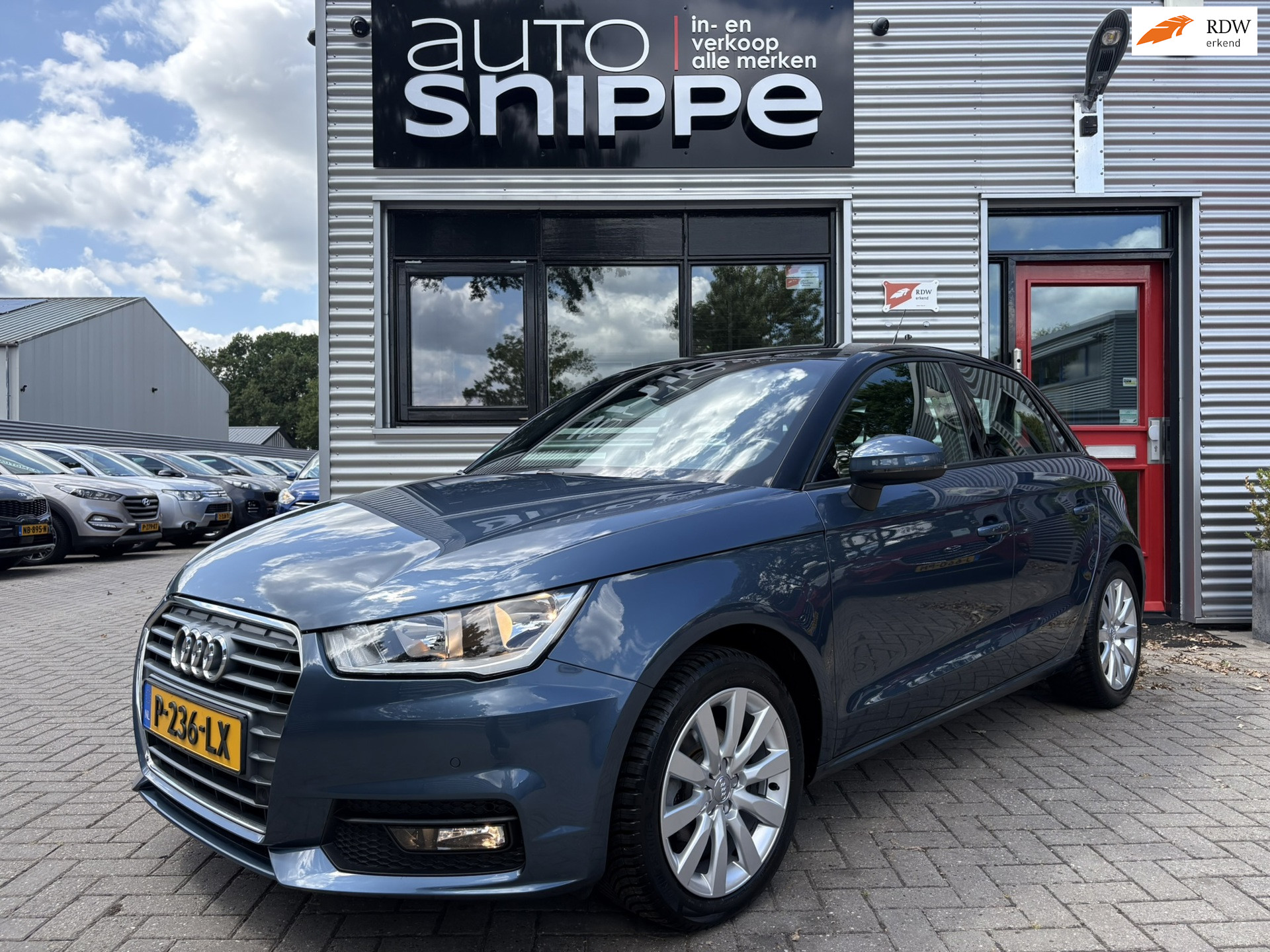 Audi A1 Sportback 1.0 TFSI Pro Line -5DRS.-2 TONE-KEYLESS ENTRY-STOELVERWARMING-NAVI-BLUETOOTH-AIRCO AUTOMATISCH-DEALER OH! 2017 - voorkant