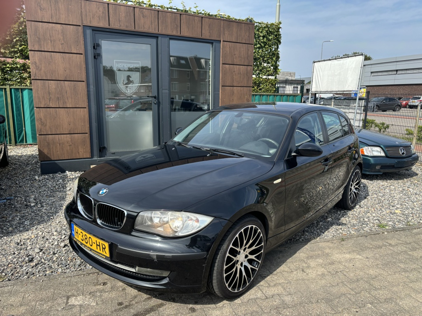 BMW 1er Reihe 116i Corporate 2009 - voorkant