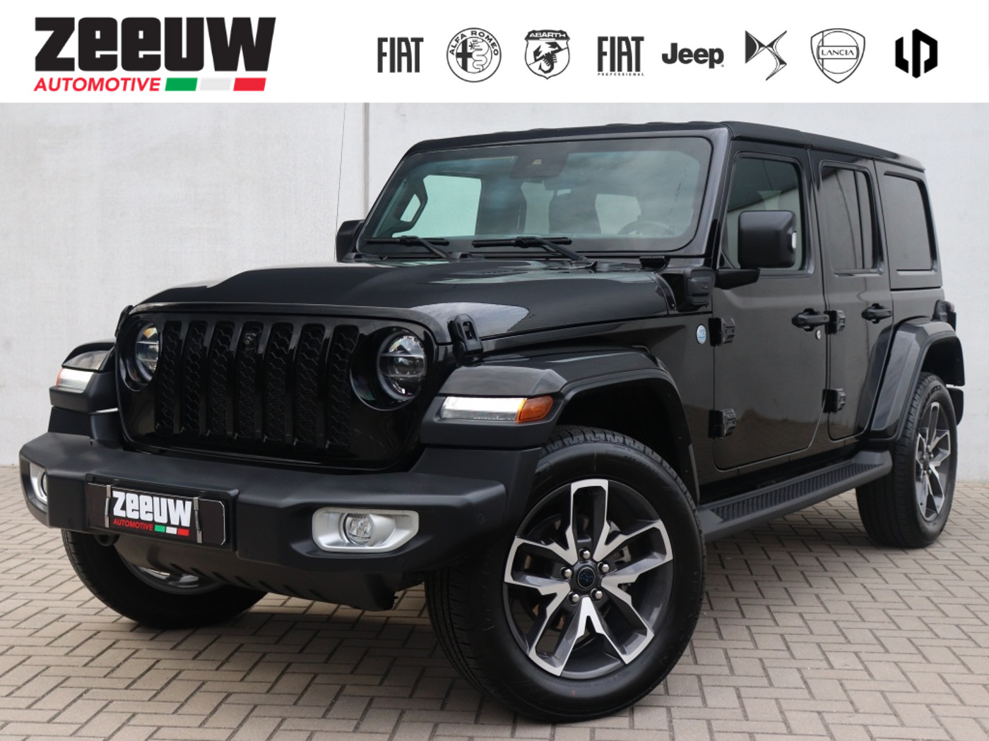 Jeep Wrangler Unlimited 4xe 380 PK Sahara | Leder | Camera | Navi | Carplay | 20" 2022 - voorkant