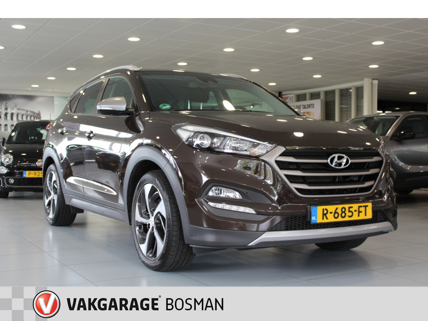 Hyundai Tucson 1.6 T-GDi Comf. 4WD/CAMERA/CRUISE/TREKHAAK 2017 - voorkant