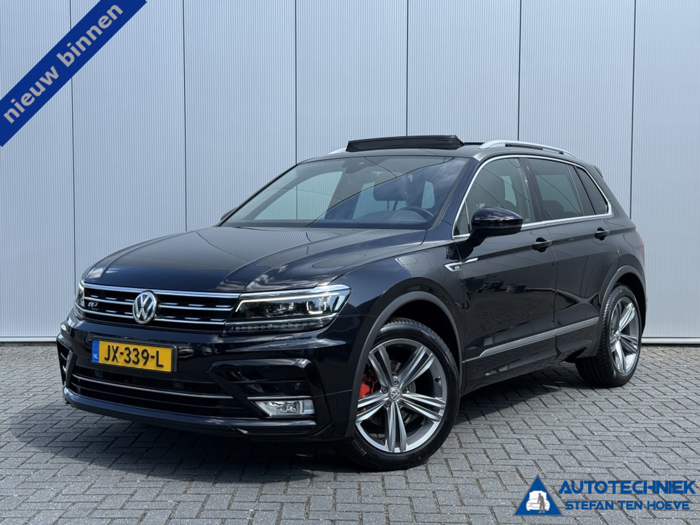 Volkswagen Tiguan 1.4 TSI R-line Panoramadak Trekhaak Carplay cruise control 2016 - voorkant