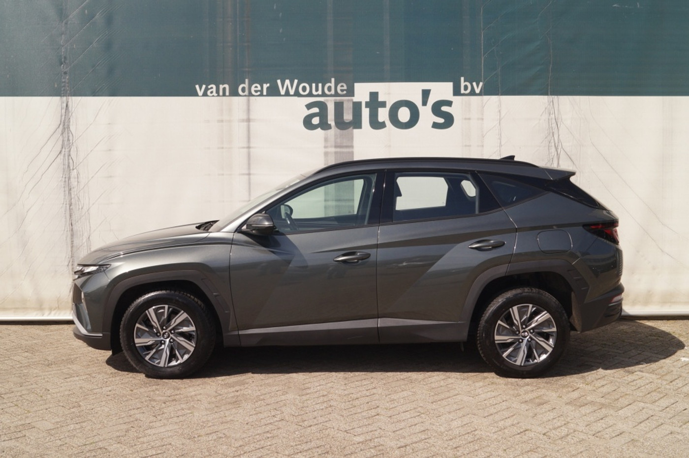 Hyundai Tucson 1.6 T-GDI HEV i-Motion -NAVI-ECC-CAM-TREKHAAK- 2023 - voorkant
