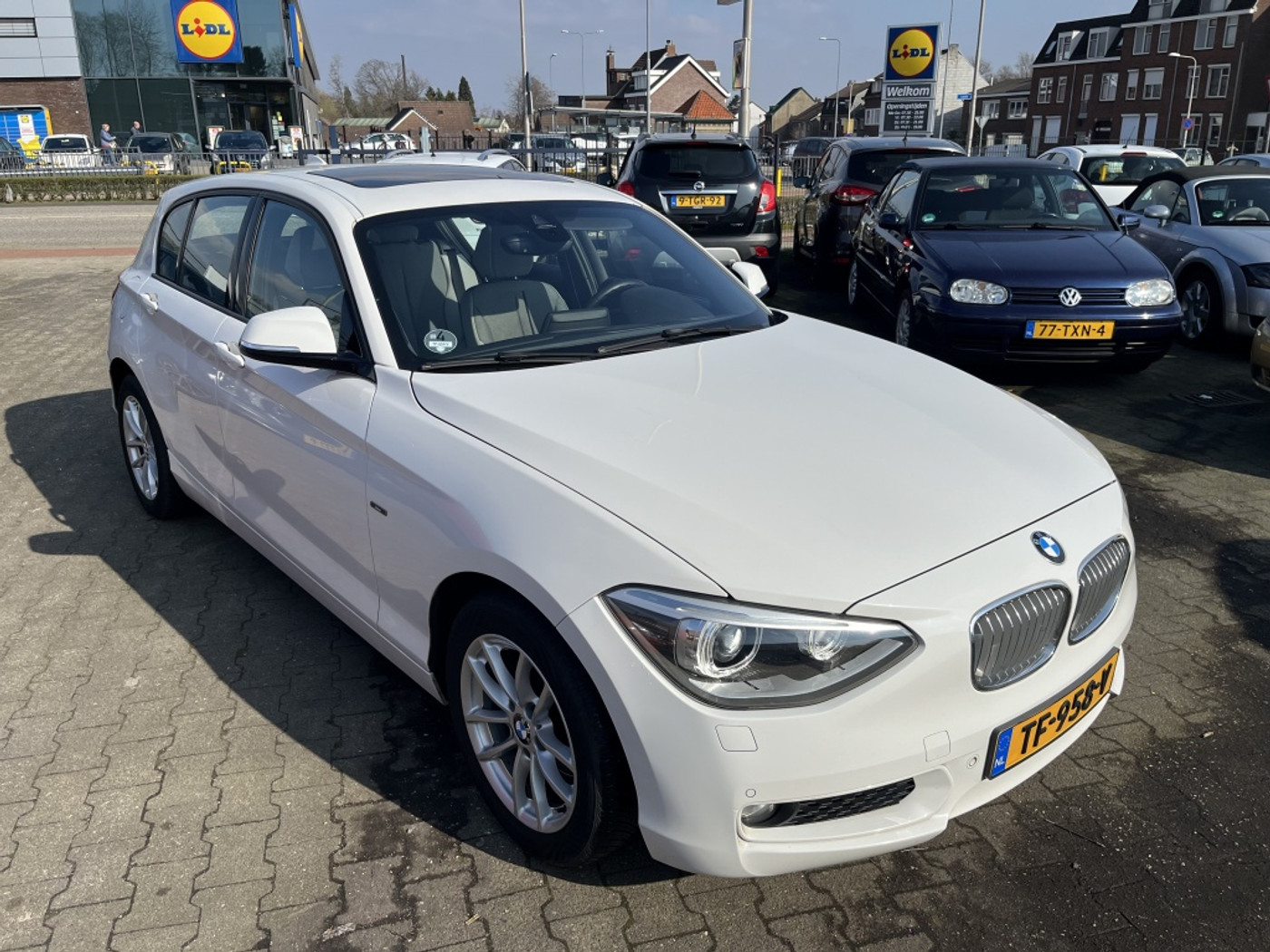 BMW 1er Reihe 116i Business+ Limited Edition /Schuifdak /Leer 2012 - voorkant