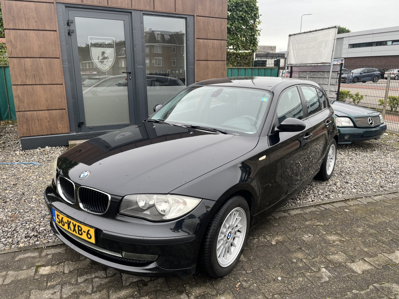 BMW 1er Reihe 118i Business Line 2010 - voorkant