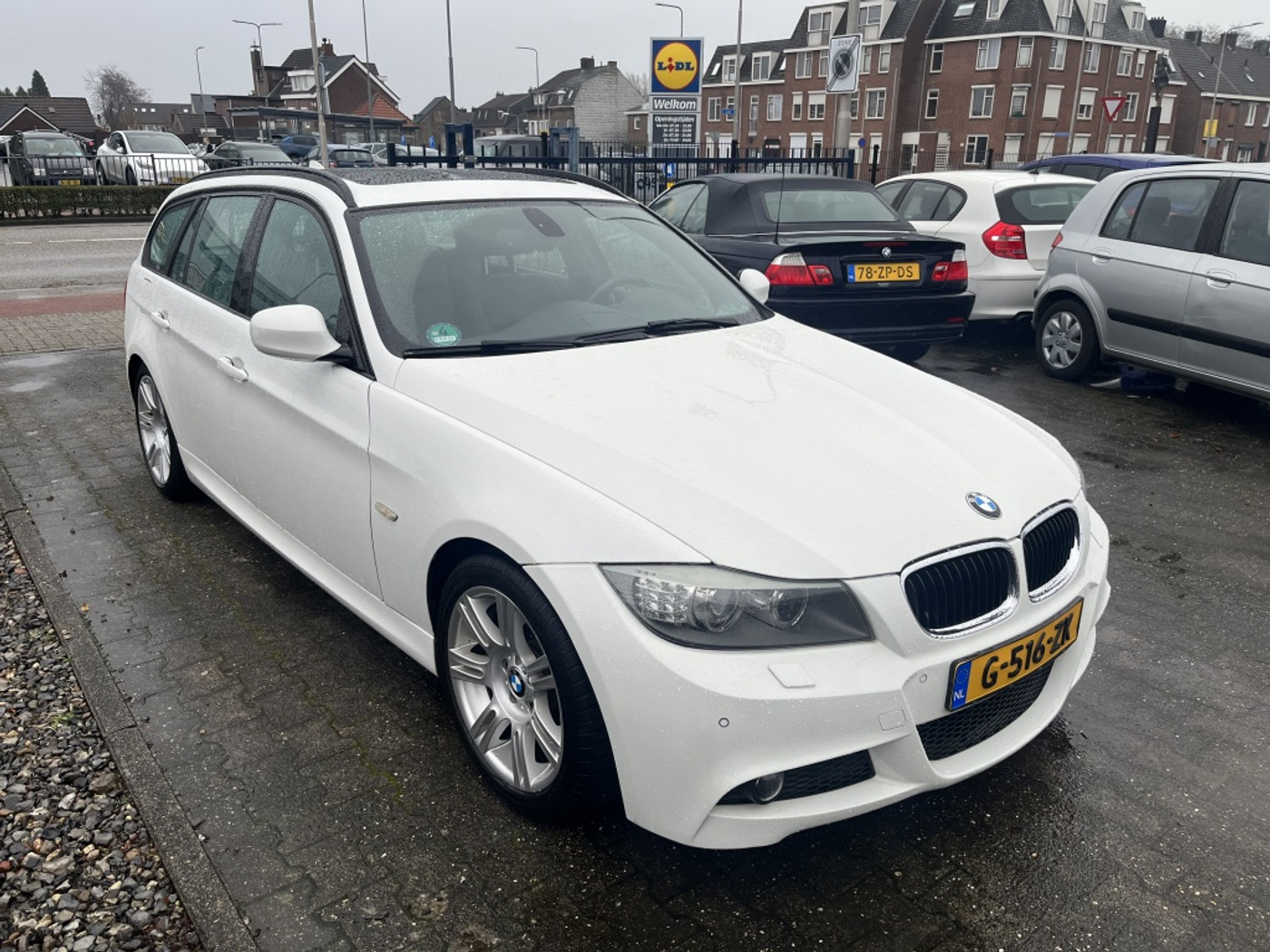 BMW 3er Reihe 318i SPORT*High Executive*AUTOMAAT*CAM*LEDER*NAVI 2010 - voorkant