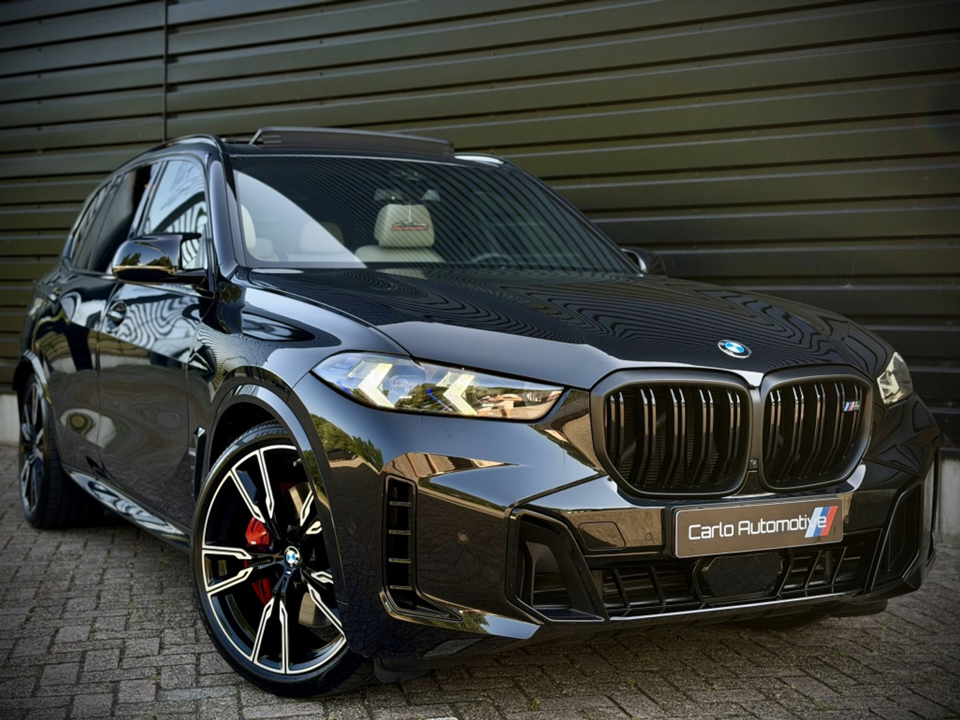 Foto van BMW X5 M60i xDrive