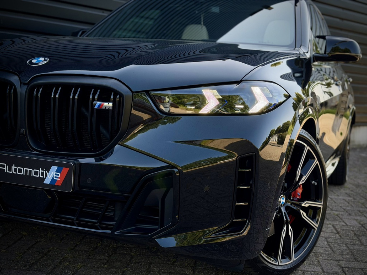 Foto van BMW X5 M60i xDrive