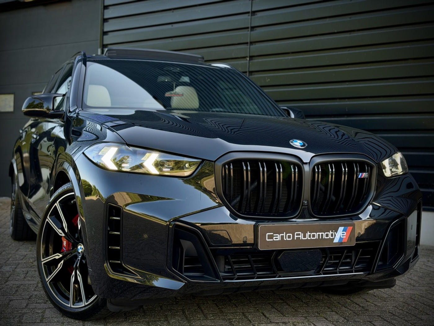 Foto van BMW X5 M60i xDrive