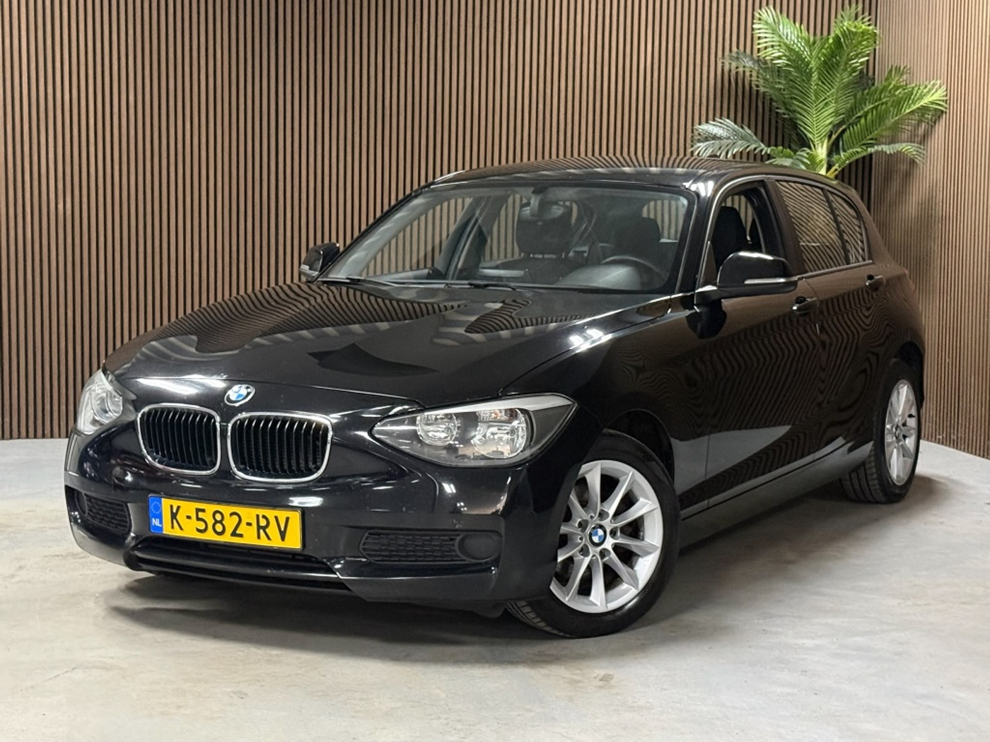 BMW 1-serie 114i EDE Business 2012 - voorkant