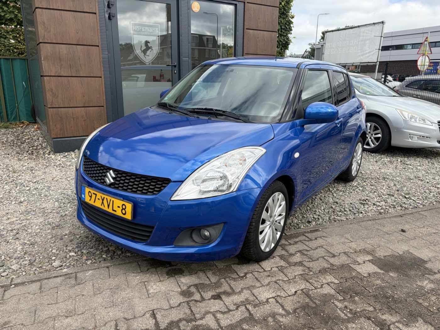Suzuki Swift 1.2 Exclusive EASSS 2012 - voorkant