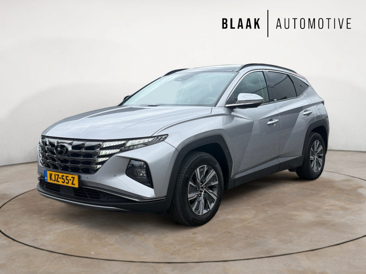 Hyundai Tucson 1.6 T-GDI 230pk HEV Comfort Smart | panoramadak | trekhaak 2021 - voorkant