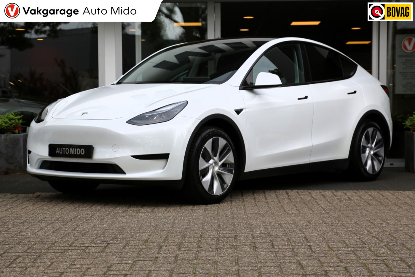 Tesla Model Y RWD 58 kWh | 1e eigenaar | All-season banden 2023 - voorkant