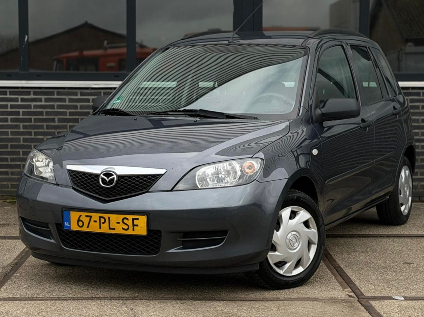Mazda Mazda 2 1.4 Exclusive |Airco |Nieuwe APK |NAP 2004 - voorkant