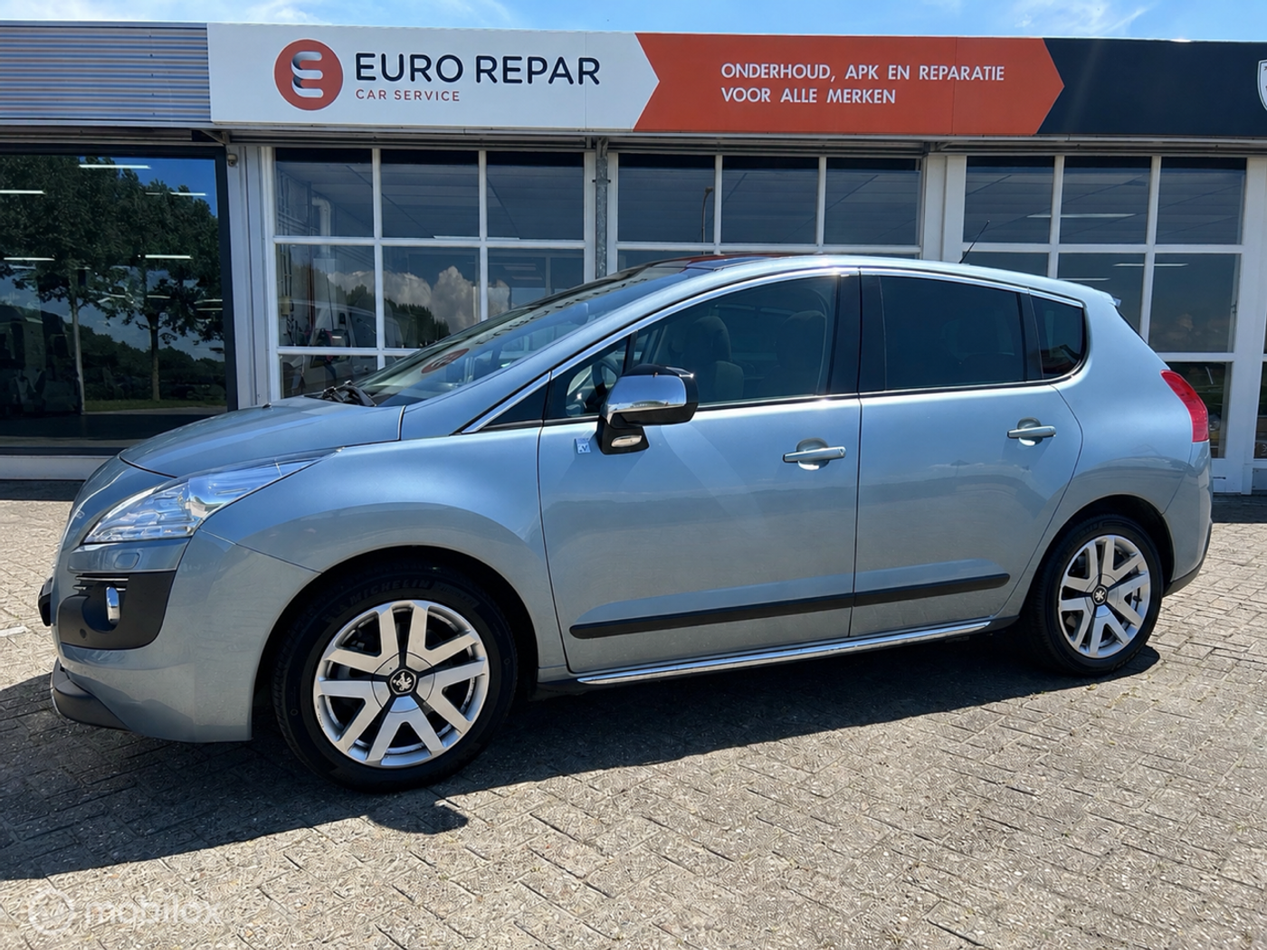 Peugeot 3008 2.0 HDiF HYbrid4 Blue Lease Executive 2012 - voorkant