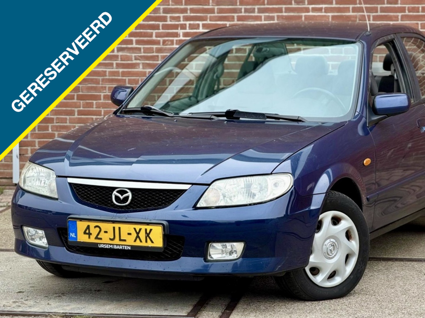 Foto van Mazda Mazda 323