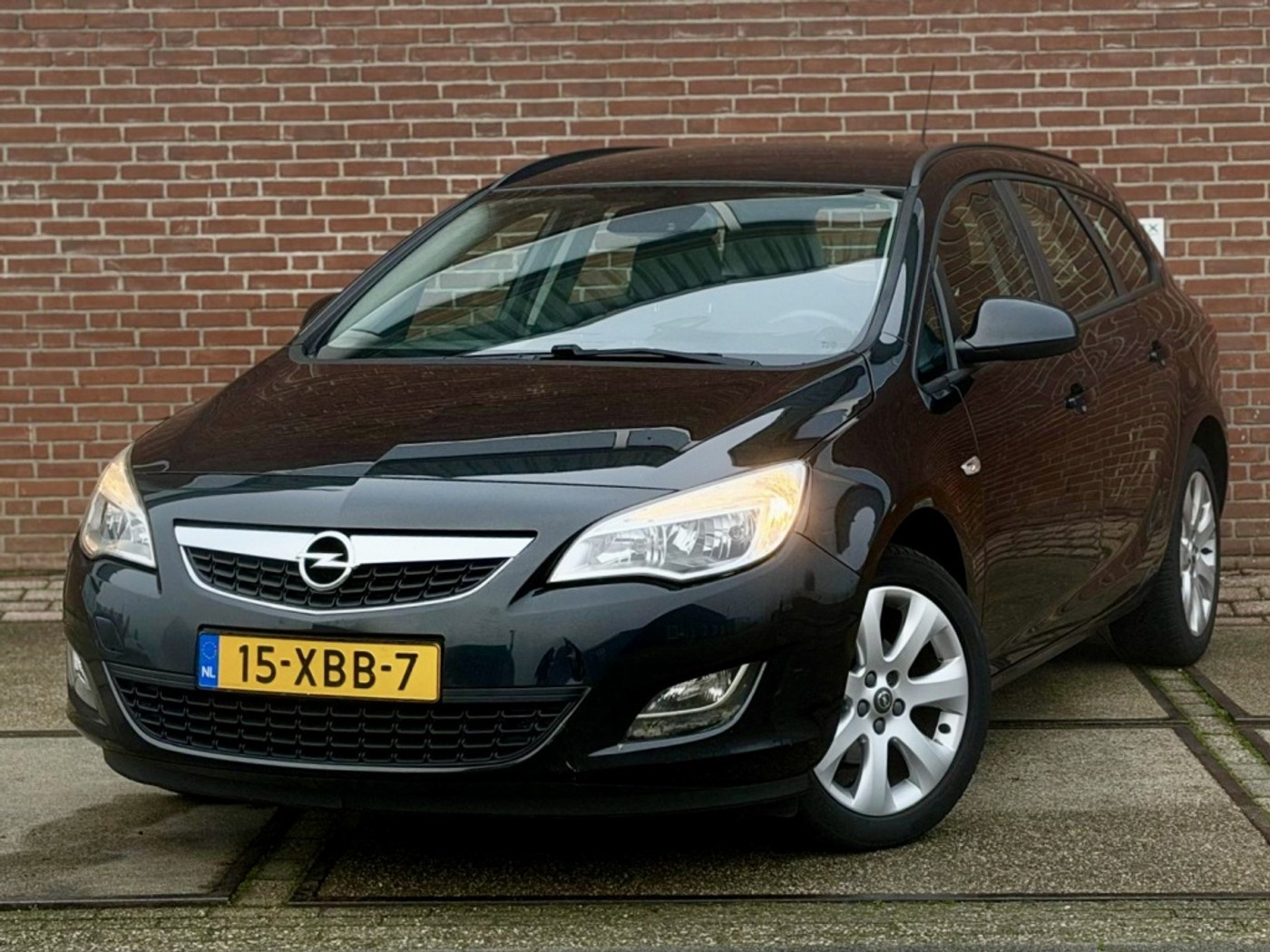 Opel Astra Sports Tourer 1.4 Turbo Cosmo |CLIMA |CRUISEC |NIEUWE APK 2012 - voorkant