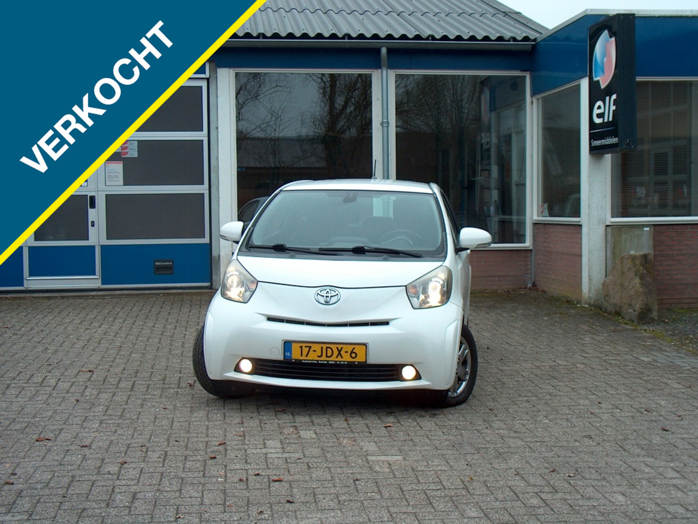 Toyota Toyota Iq 1.0 VVTi Comfort, parelmoerwit 2009 - voorkant